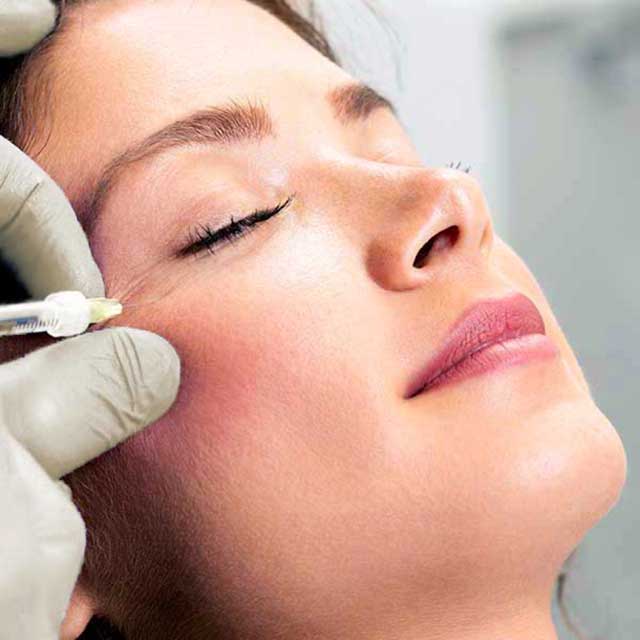 Woman getting Botox injection