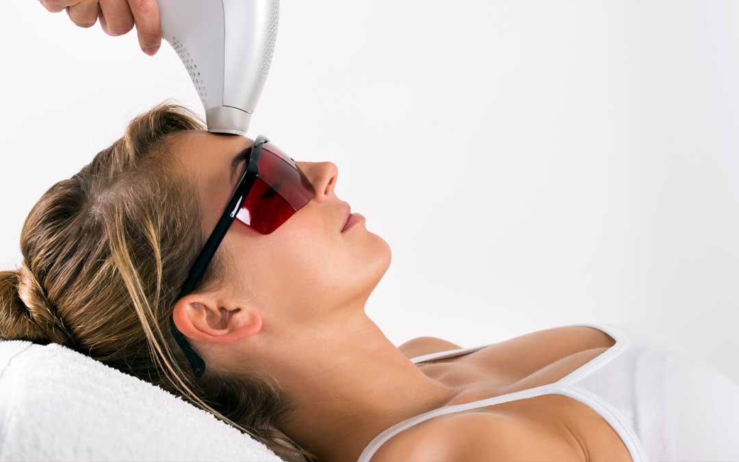 Woman Undergoing Laser Treatment